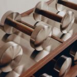 Oak and steel dumbbell from the 2026 Zara Home Gym Collection.