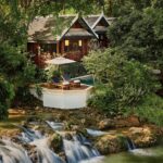 Waterfall and creek running through the grounds of Rosewood Luang Prabang in Laos