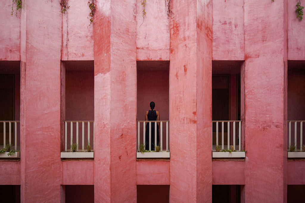 Balcony at Laiva Plaza hotel by RA! The Rosa Mexicano handcrafted stucco facade catches the shifting Baja light across its receding vertical planes.