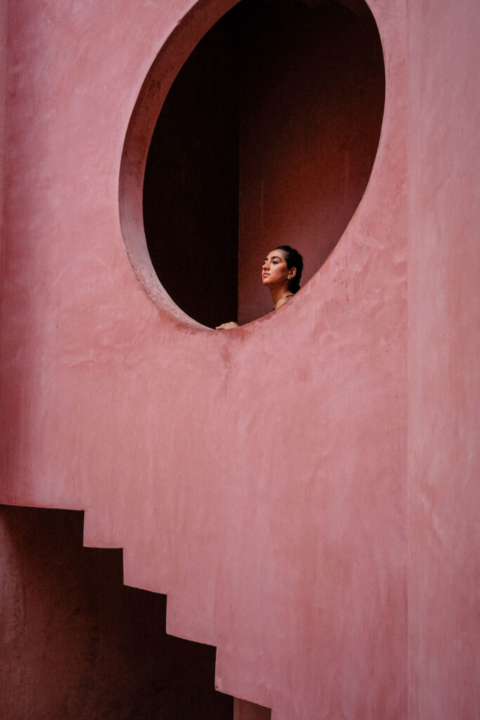 The circular aperture and courtyard staircase of Laiva Plaza hotel by RA! A sculptural element unique to Mexican modernism, set in Rosa Mexicano handcrafted stucco.