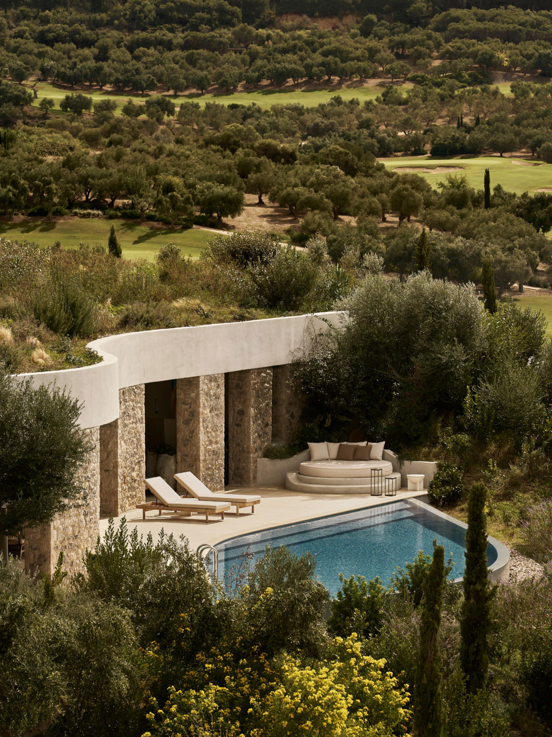 Villa with a private pool and planted roof at Mandarin Oriental, Costa Navarino, among olive groves.